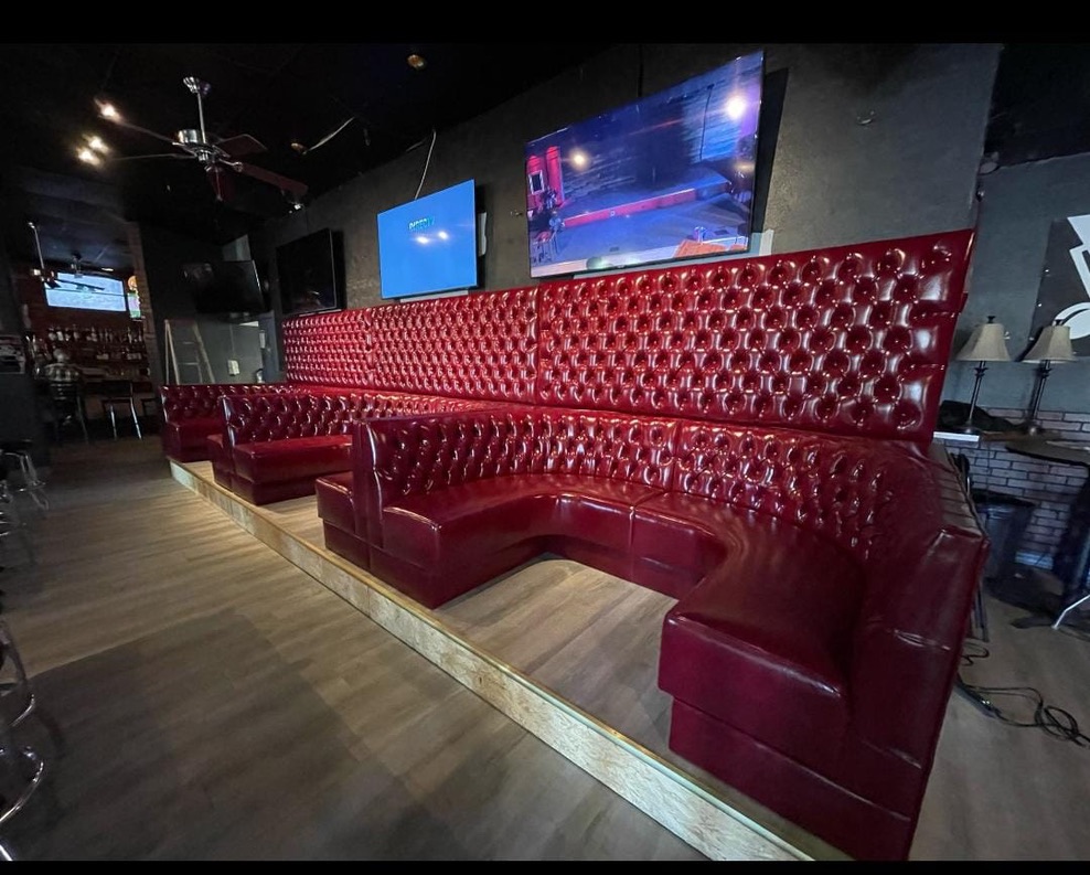 Tufted booths and wall panels at Cactus Jack’s