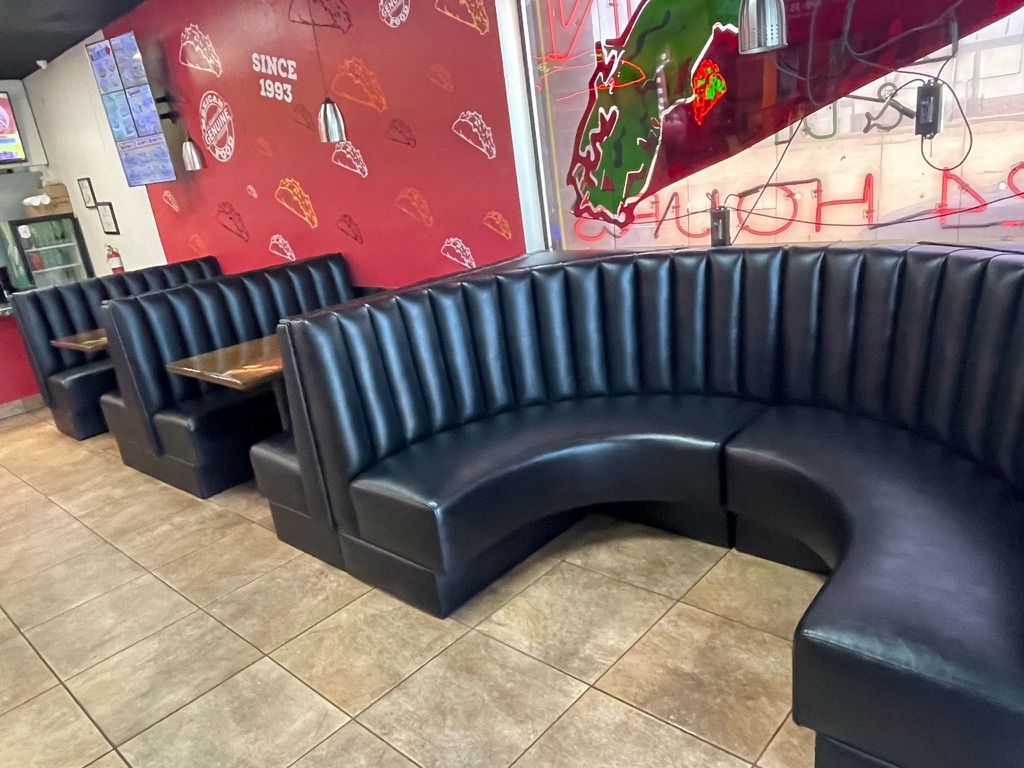 Black channel-back booths at Filiberto’s