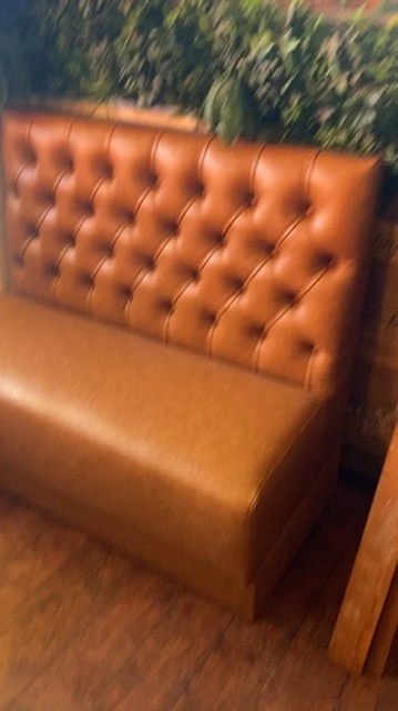 cognac tufted booth — 