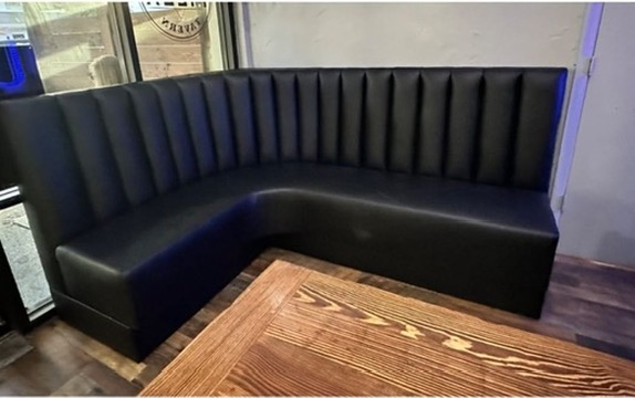 Dark channel corner banquette in downtown Tampa