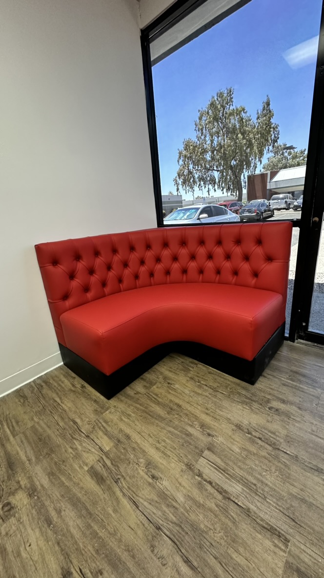 red tufted corner black base onsite — onsite seating photograph