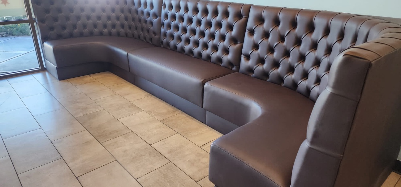 brown tufted u banquette angle — onsite restaurant seating photograph