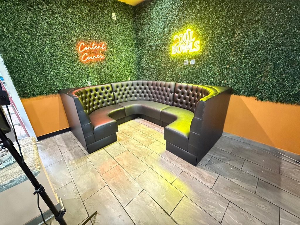 Tufted corner booth at Mesa Drummer