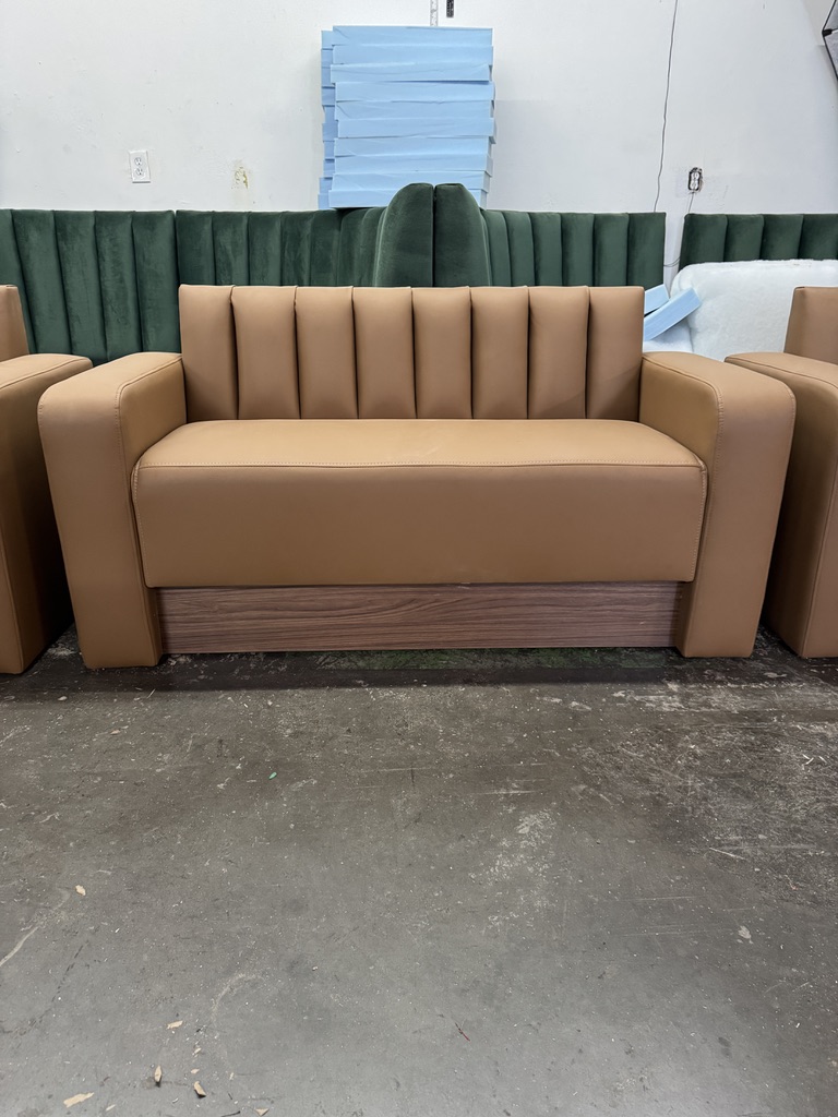Tan channel-back lounge seating for Miami
