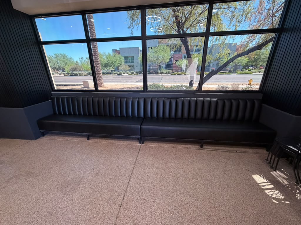 Black banquette reupholstery for a remodeled patio
