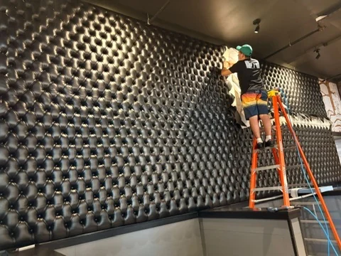 Diamond-tufted wall upholstery