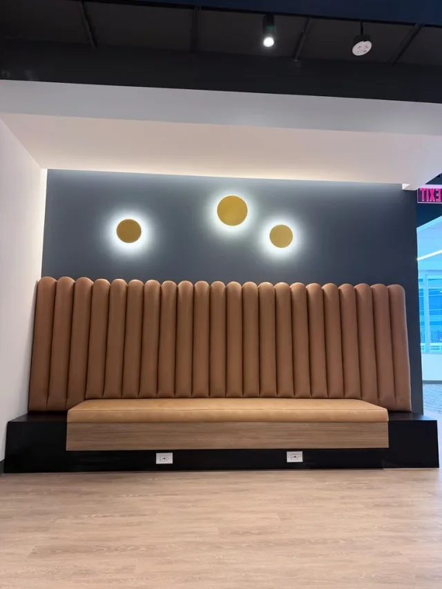 Channel seating with wood base and integrated outlets