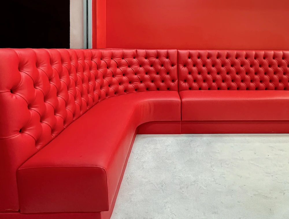 US Booths custom curved red booth for commercial shop